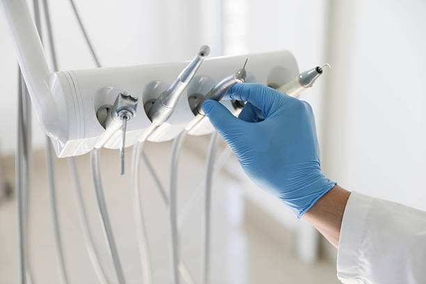 Professional Tooth Extraction technician working in South Rosemary, NC